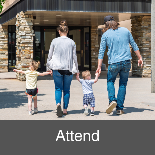family walking into the library